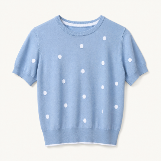 Blue polka dot knit top, front flat-lay view