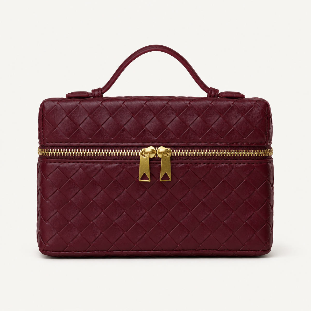 Black structured woven top-handle bag with gold-tone hardware on white background